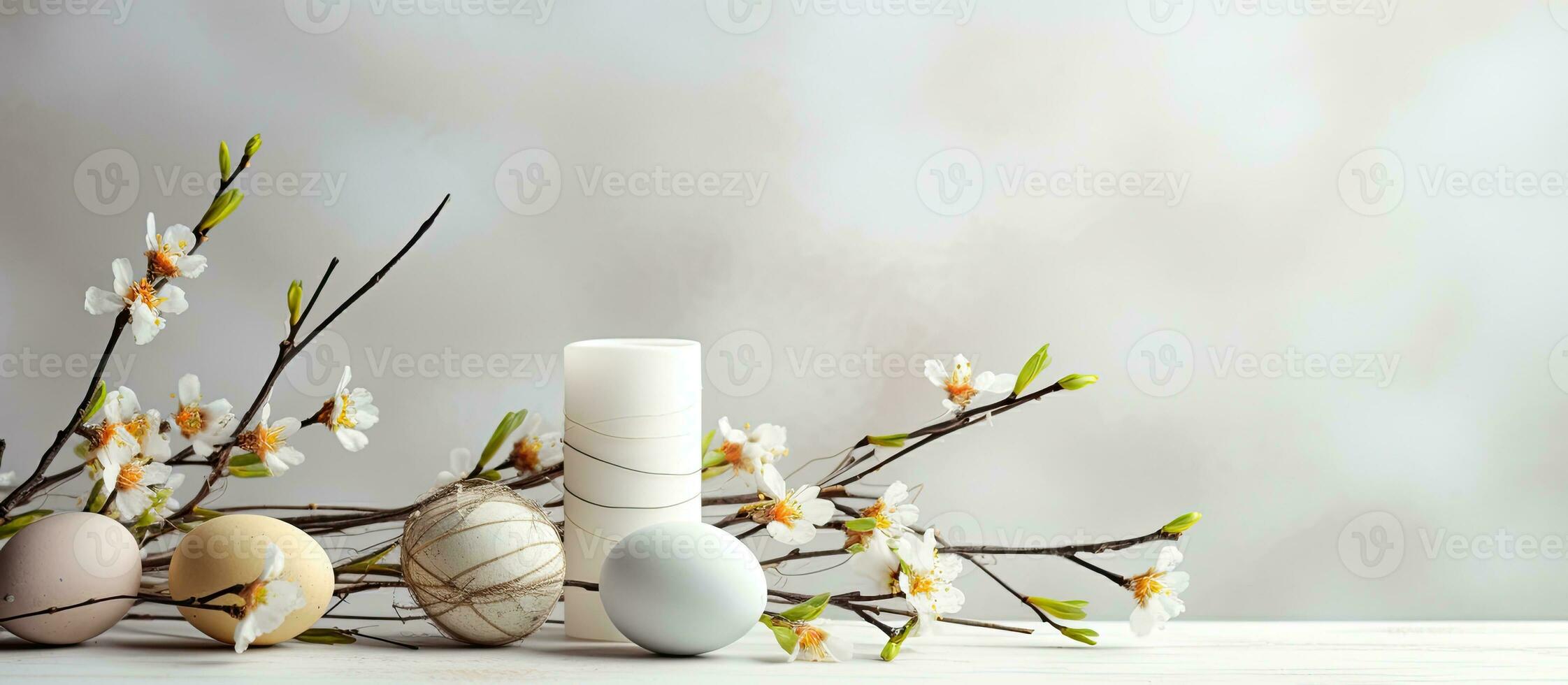 Easter Candle Eggs, Easter Bunny, and Willow Branches on a white textured background. represents photo