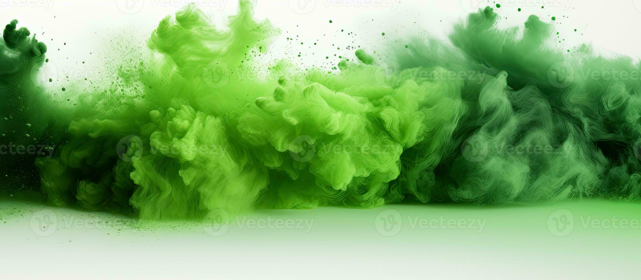 Green powder or dust explosion in a square border on a white backdrop, available space for use. photo