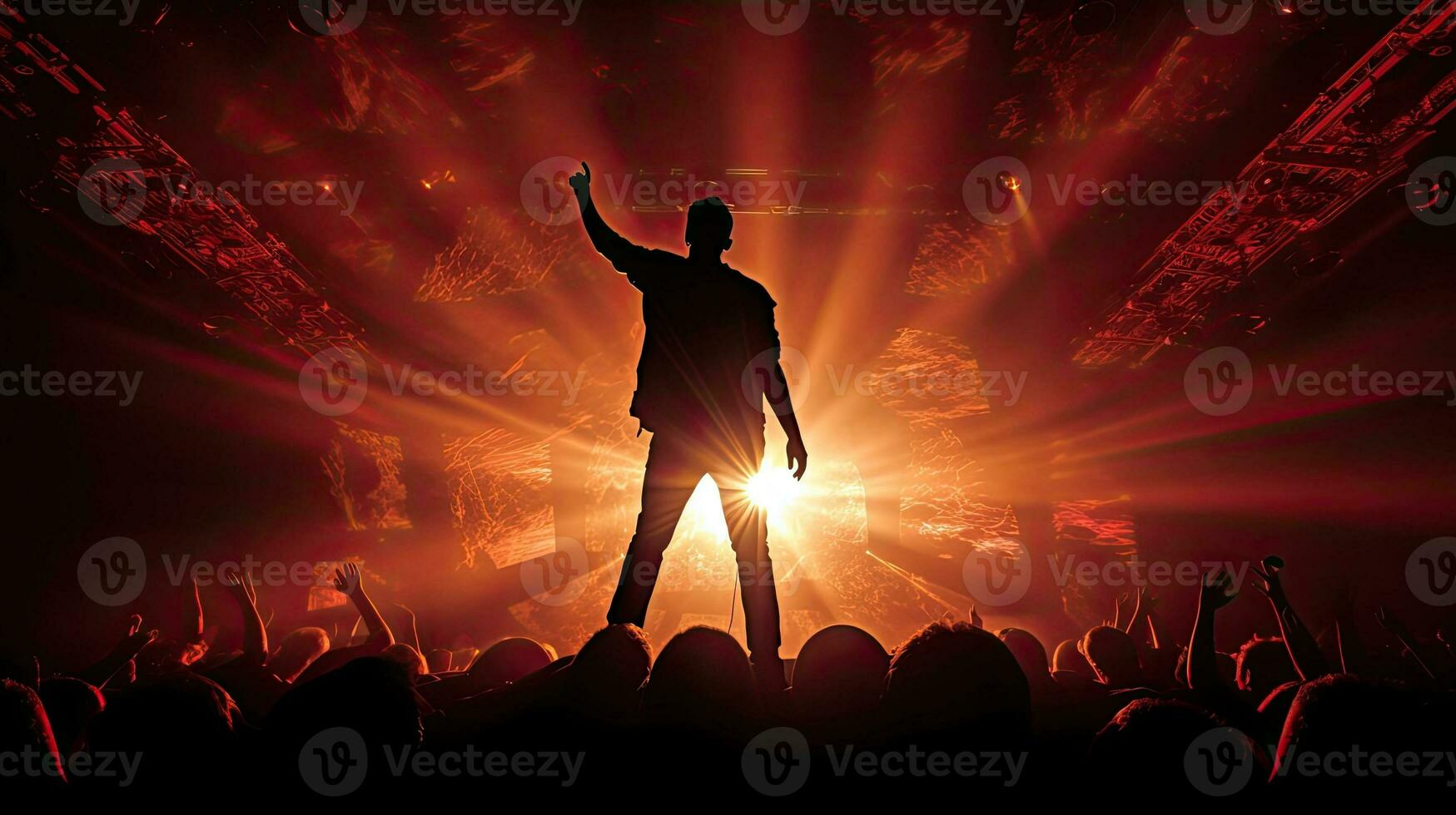 Male singer s silhouette illuminated by stage lights at a rock concert photo