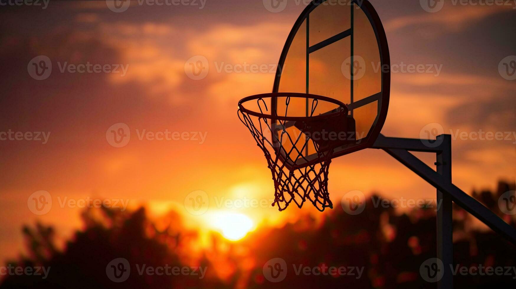 Ideal wallpaper with sunset silhouette in basketball hoop photo