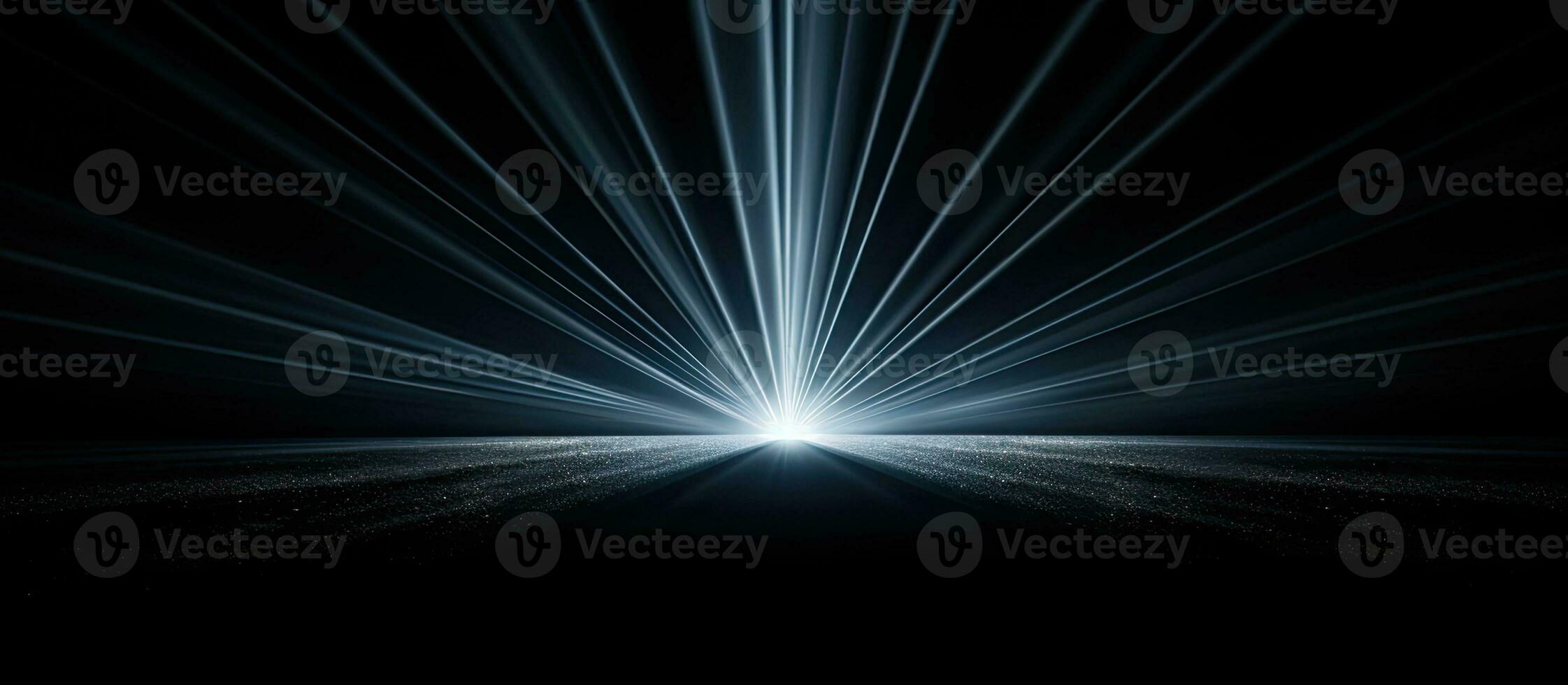 Close up view of a light ray on a black backdrop photo