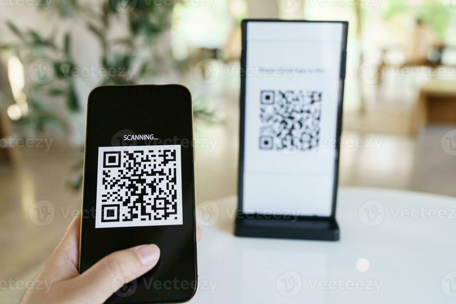 Qr code payment. E wallet. Man scanning tag accepted generate digital pay without money.scanning QR code online shopping cashless payment and verification technology concept. photo