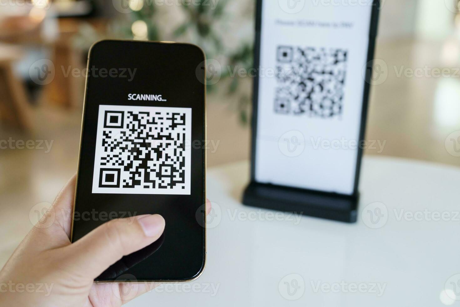 Qr code payment. E wallet. Man scanning tag accepted generate digital pay without money.scanning QR code online shopping cashless payment and verification technology concept. photo