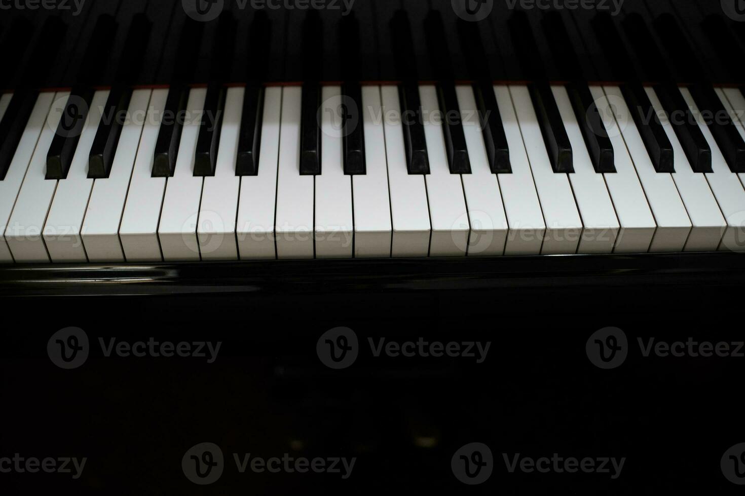 Piano keyboard background with selective focus. photo