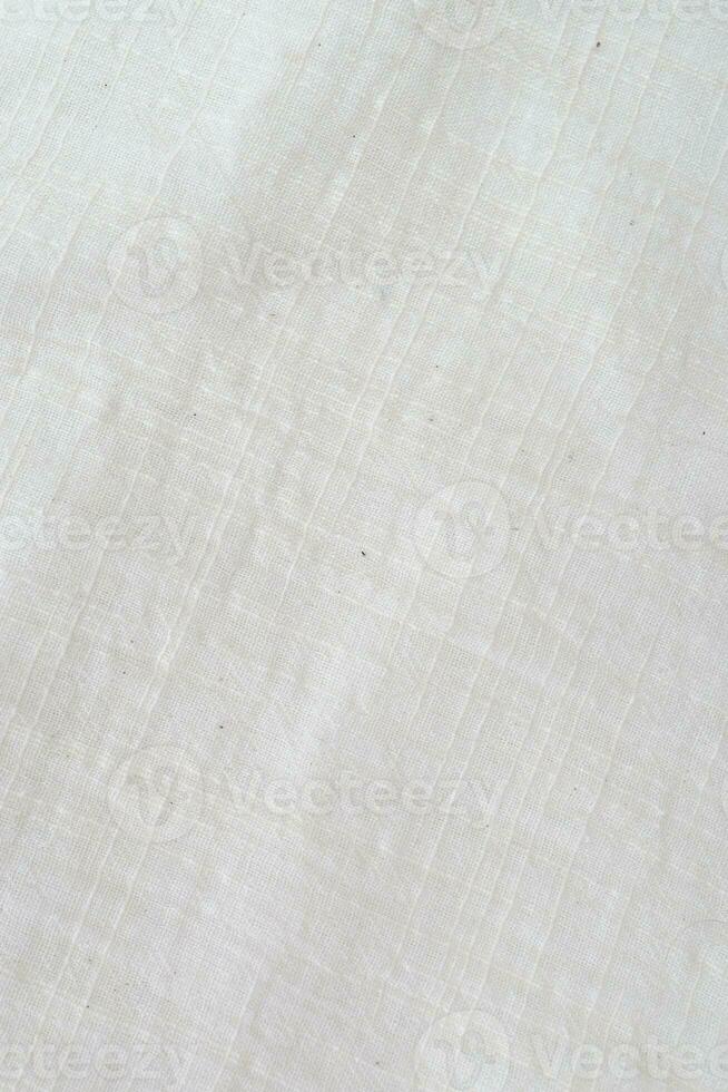 Fabric backdrop White linen canvas crumpled natural cotton fabric Natural linen top view  background  Organic Eco textiles White Fabric texture photo