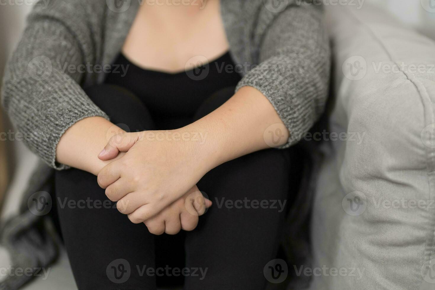 Sad Overweight plus size woman thinking about problems on sofa upset girl feeling lonely and sad from bad relationship or Depressed woman disorder mental health. photo