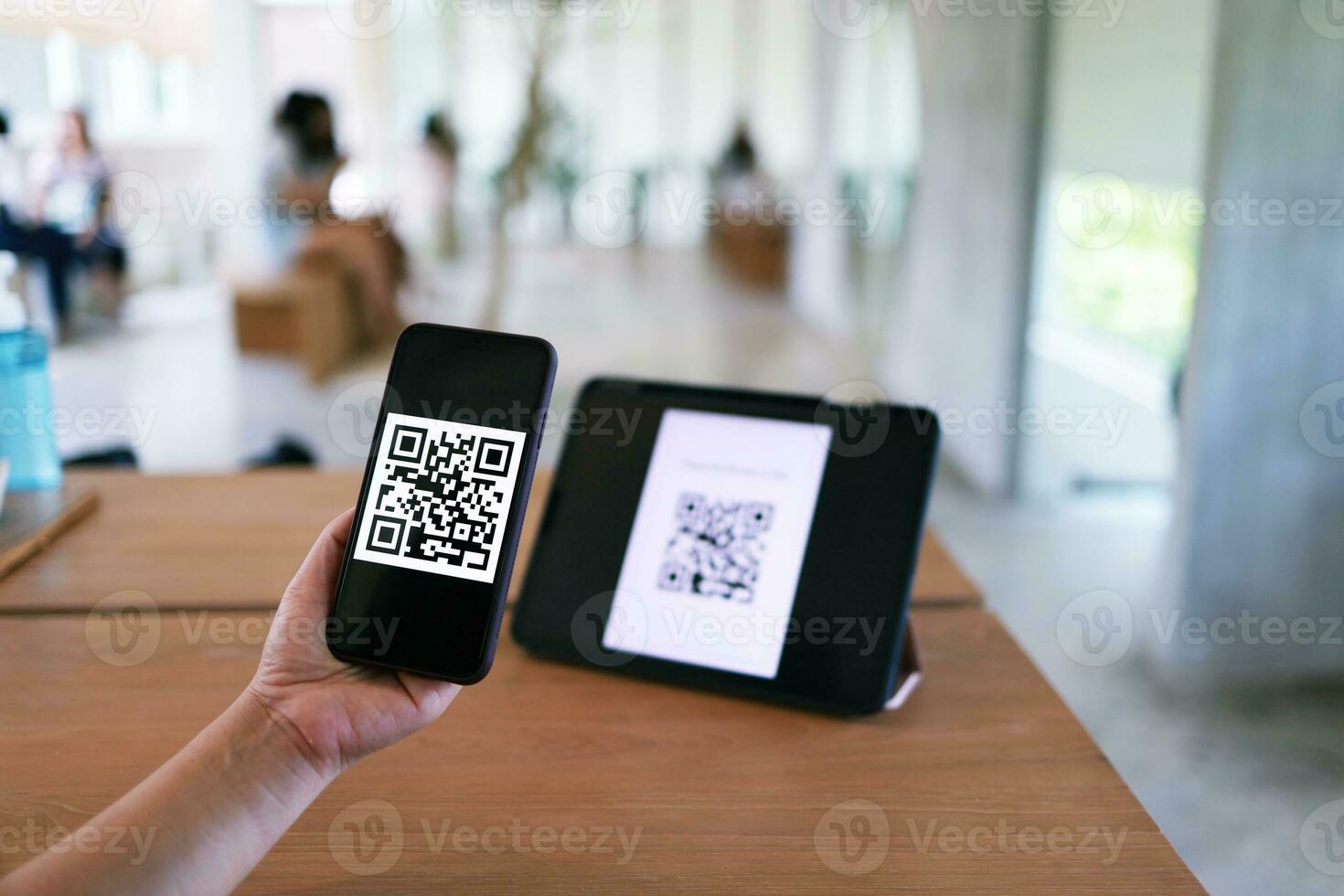 Qr code payment. Woman scanning QR code online shopping cashless technology concept. photo