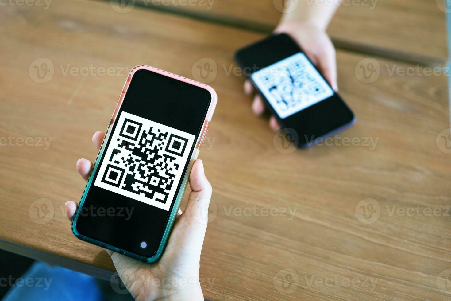 Qr code payment. Woman scanning QR code online shopping cashless technology concept. photo
