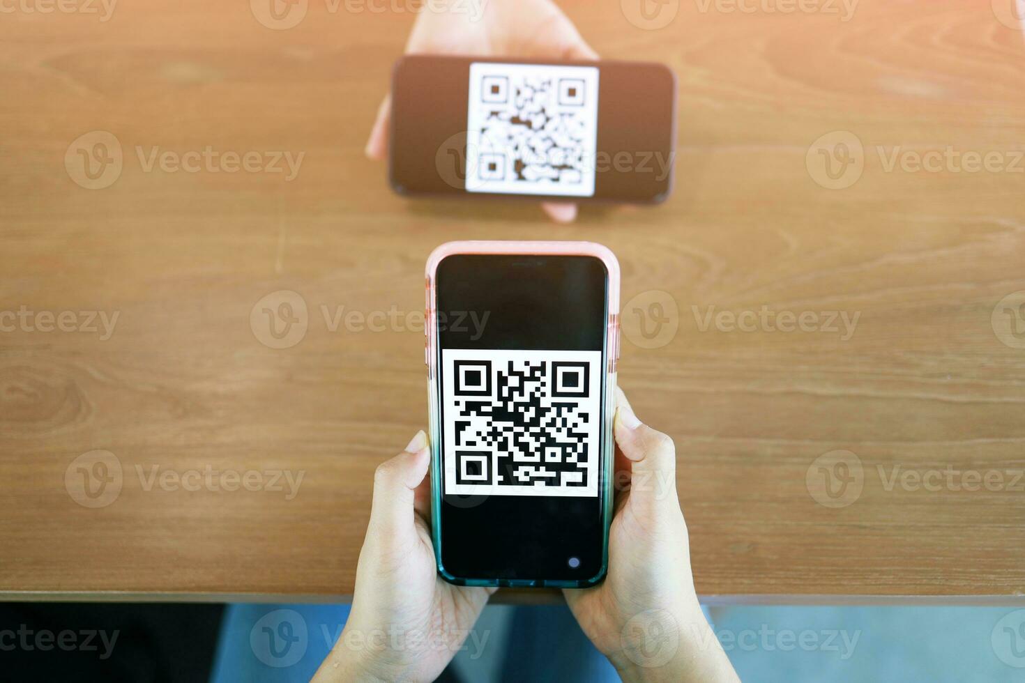 Qr code payment. Woman scanning QR code online shopping cashless technology concept. photo