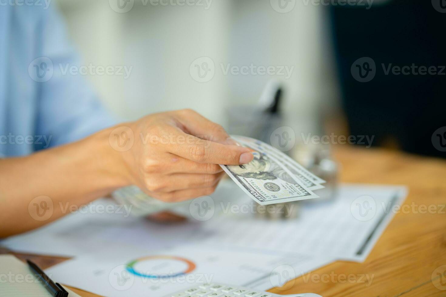 Saving money. Businessman Accountant verify growing business and saving money stacking coins with calculator. Accountancy Concept. photo