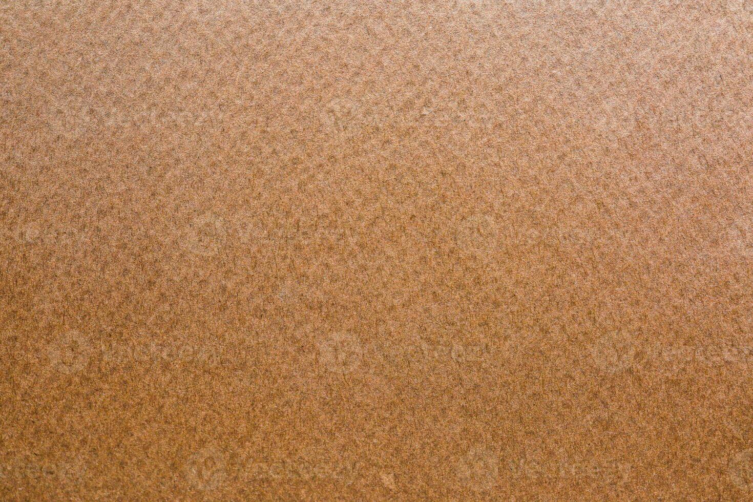 Old Kraft paper craft vintage pattern. brown recycled paper texture background photo