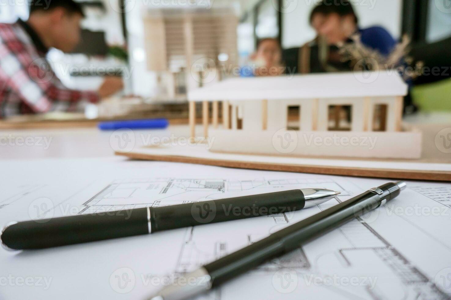 Architecture drawing on architectural project business architecture building construction Colleagues interior designer Corporate. Planning Design on blueprint Teamwork with compasses. photo