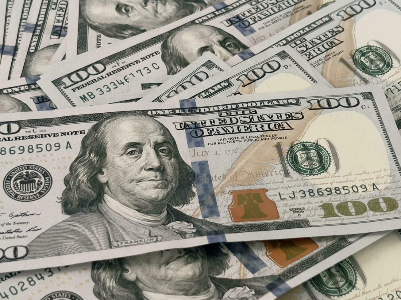 Texture of US dollars. Background of one hundred.Dollar background.USA money photo