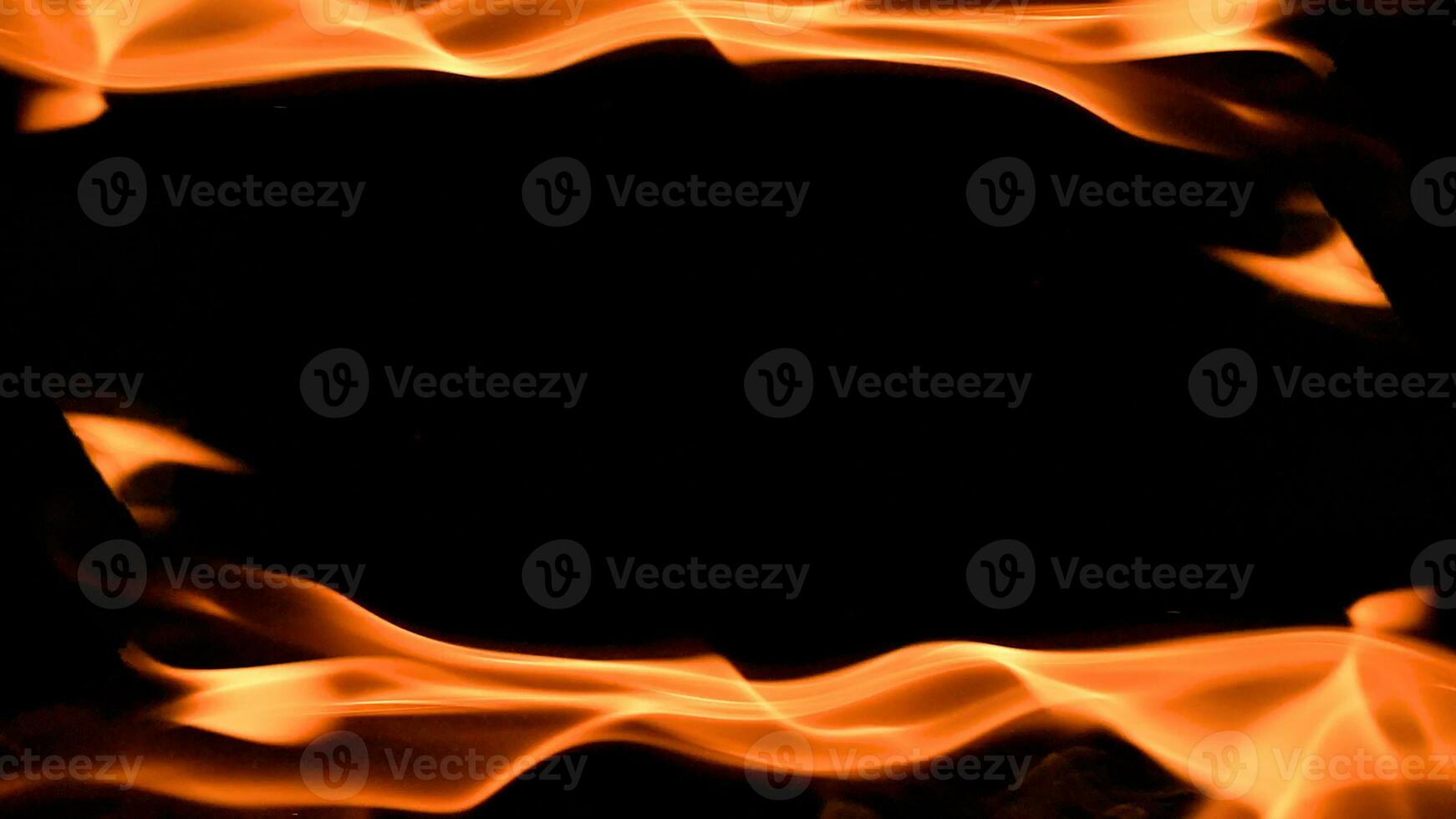 fire background burning flame frame on a black background photo