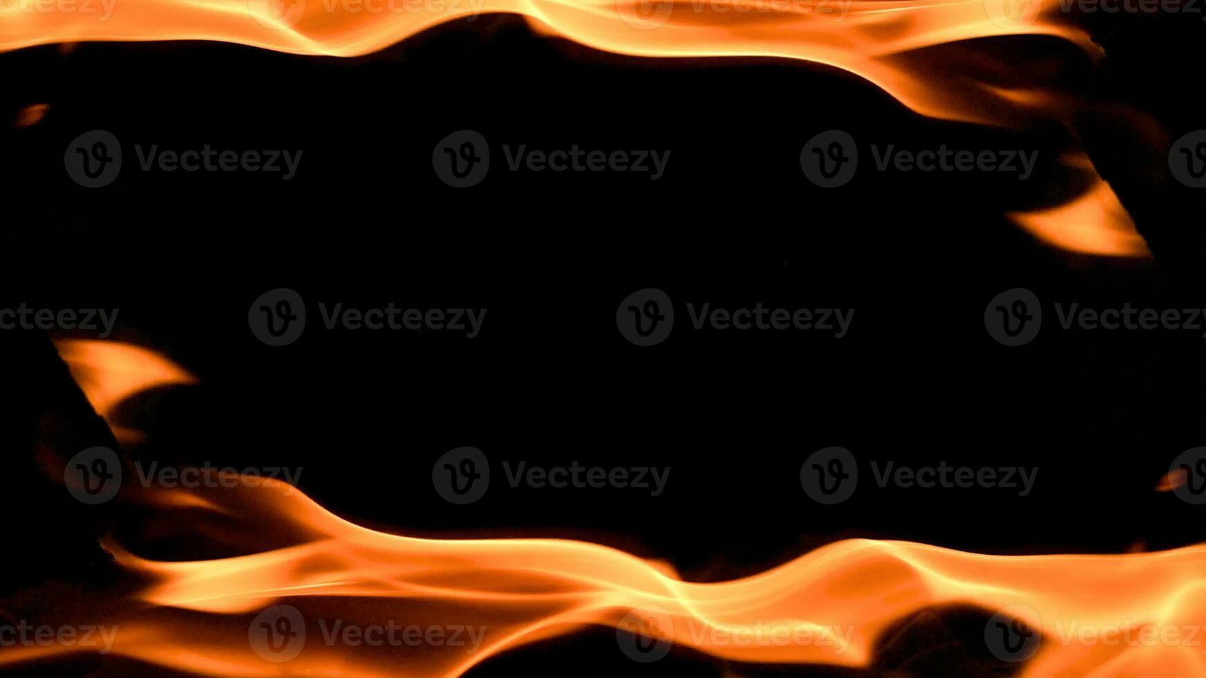 fire background burning flame frame on a black background photo