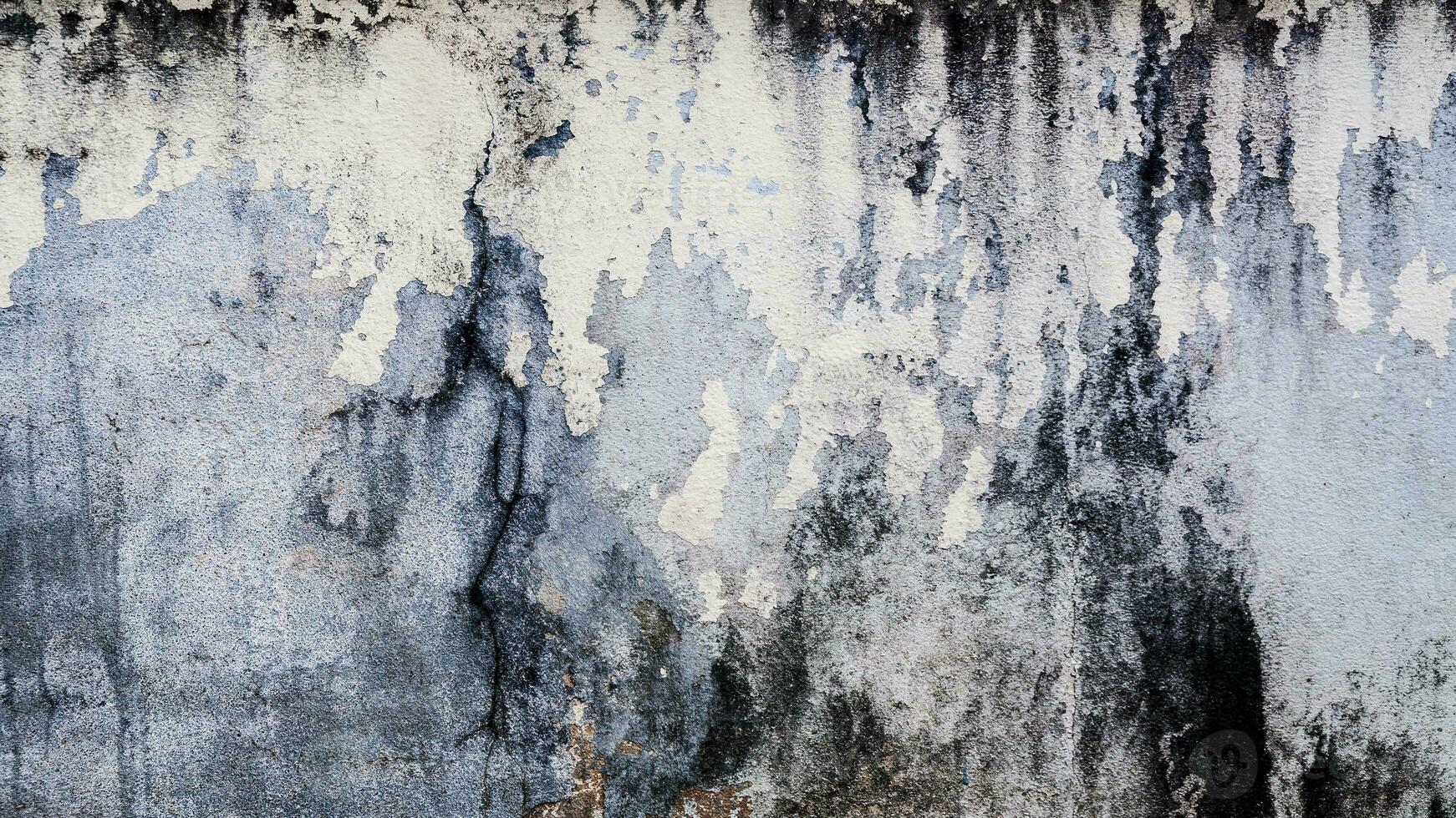 Old cement wall peel exterior texture background with white Paint peeling low quality, Cracked Wall photo