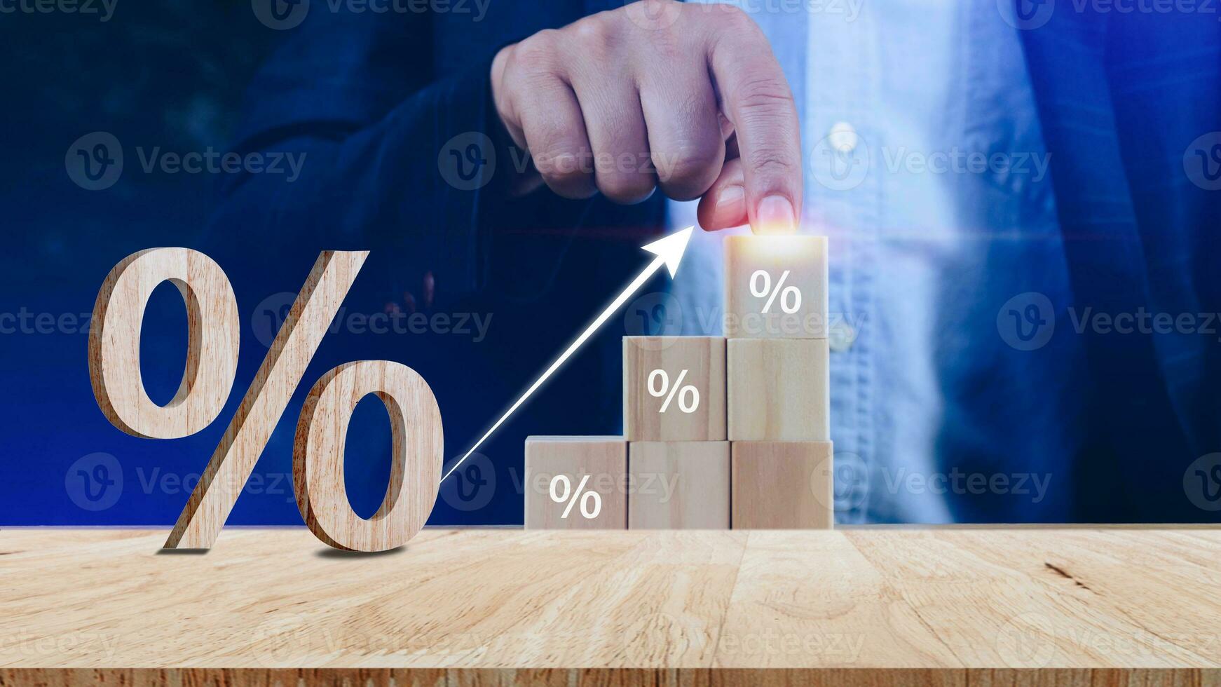 Close-up of percent sign leaning on wooden table, Percentage Sign And Discount Rate. Accountant VAT Tax Concept. photo