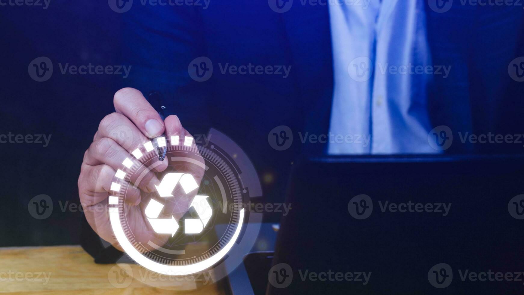 Businessman hand touching recycle icon concept in screen, for environmental, social and governance in sustainable and ethical business on the Network connection. photo