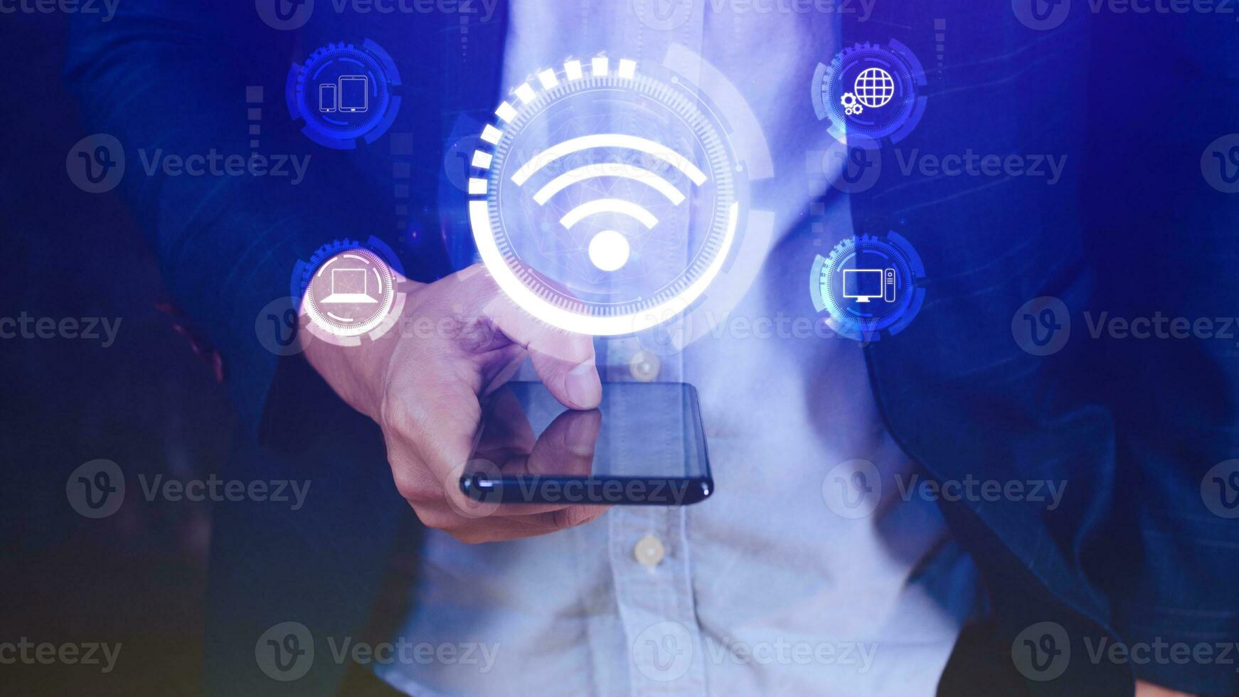 Businessman using smartphone with wifi icon. Social network business communication concept, Wifi wireless concept free network Internet concept. photo