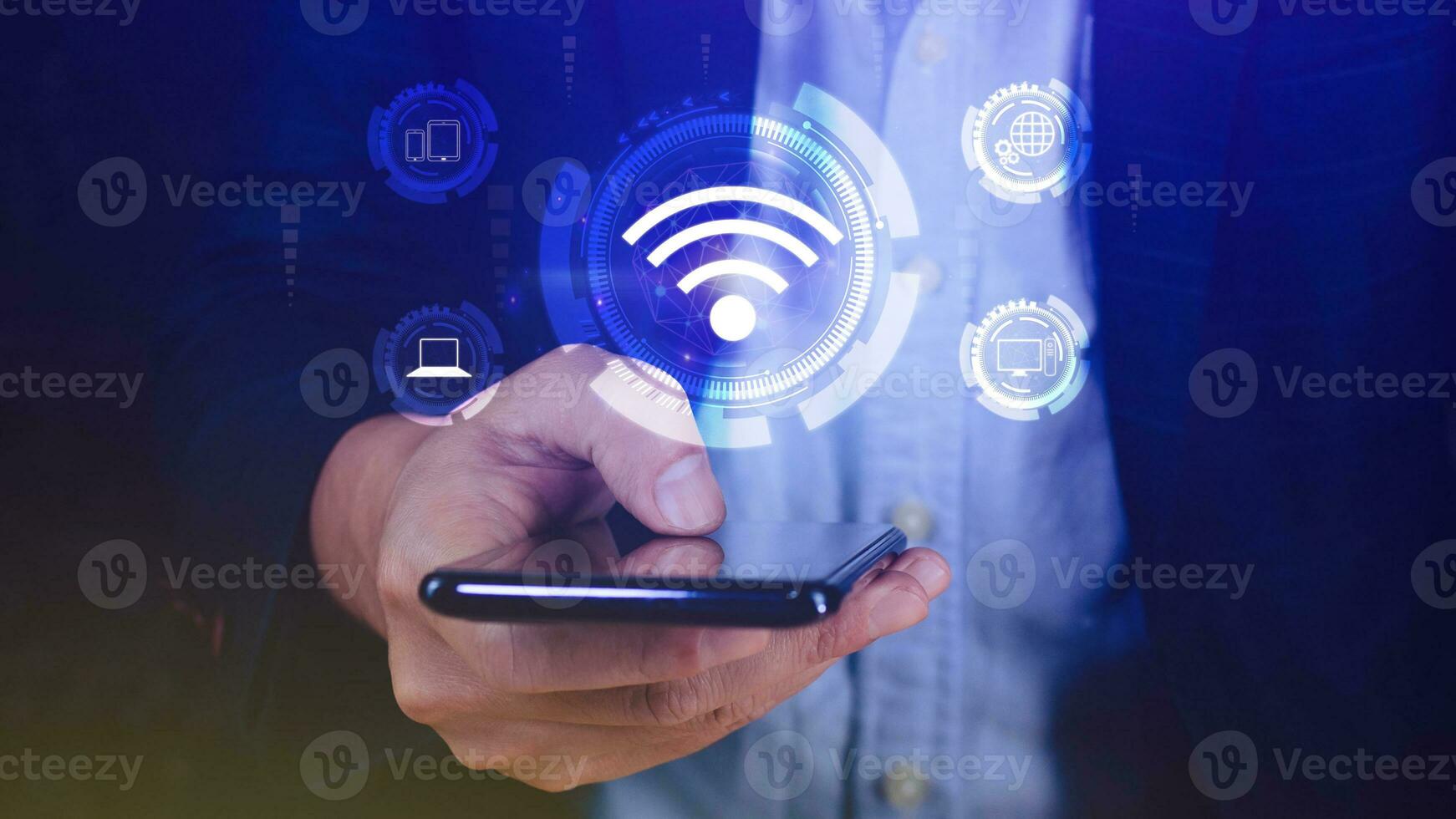 Businessman using smartphone with wifi icon. Social network business communication concept, Wifi wireless concept free network Internet concept. photo