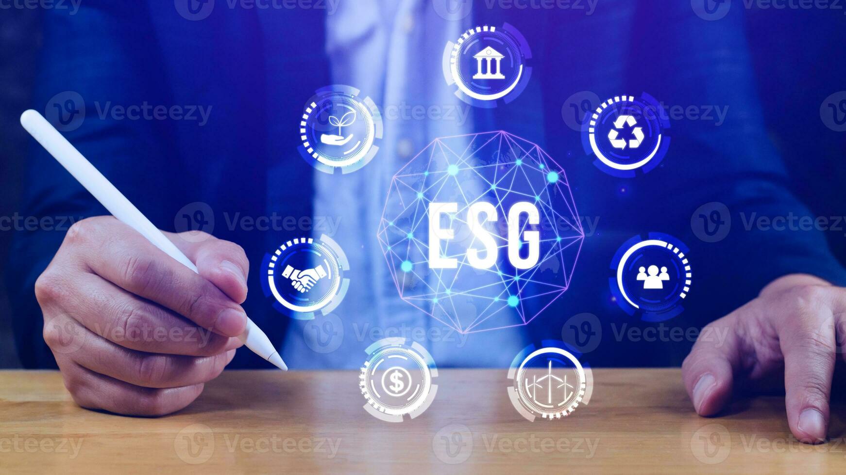 ESG icon concept in the hand for environmental, social and governance in sustainable and ethical business on the Network connection, businessman pressing button on screen. photo