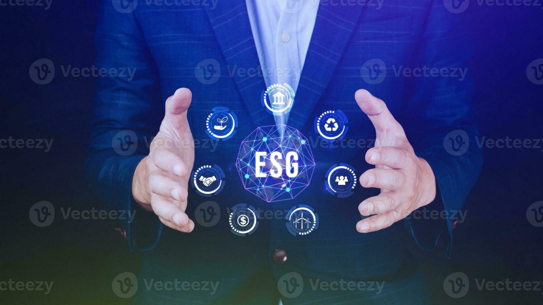 ESG icon concept in the hand for environmental, social and governance in sustainable and ethical business on the Network connection, businessman pressing button on screen. photo