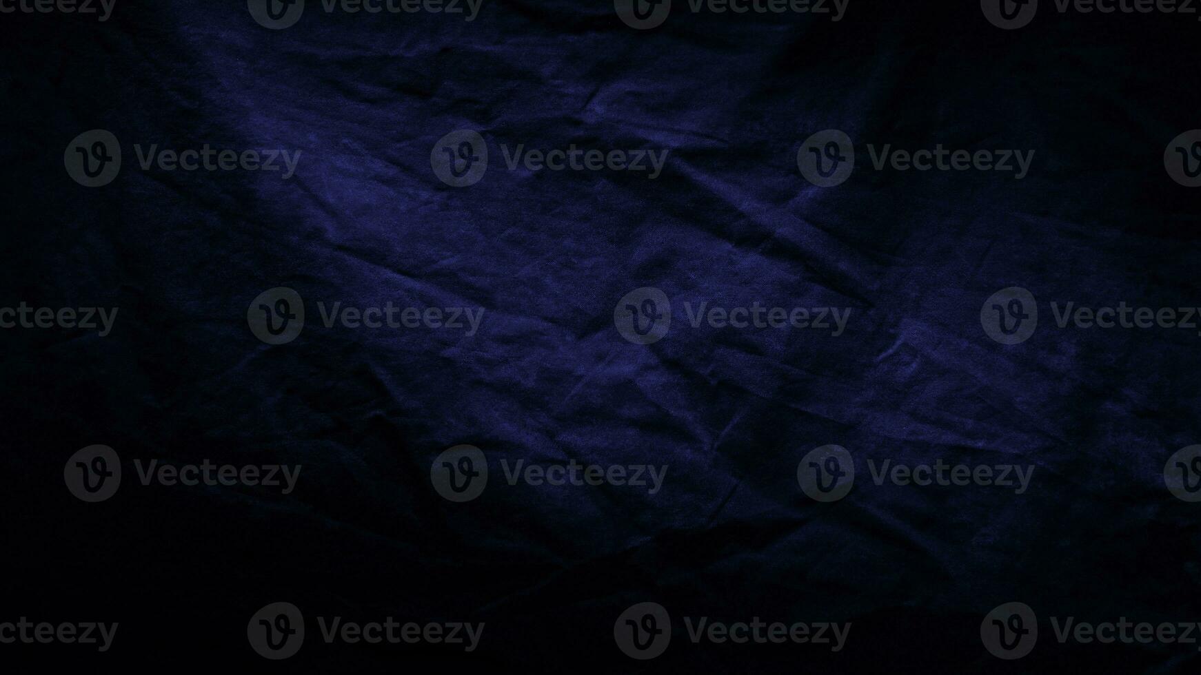 Abstract dark background. Silk satin fabric, Navy dark color, Elegant background with space for design, surface dark fabric texture background photo