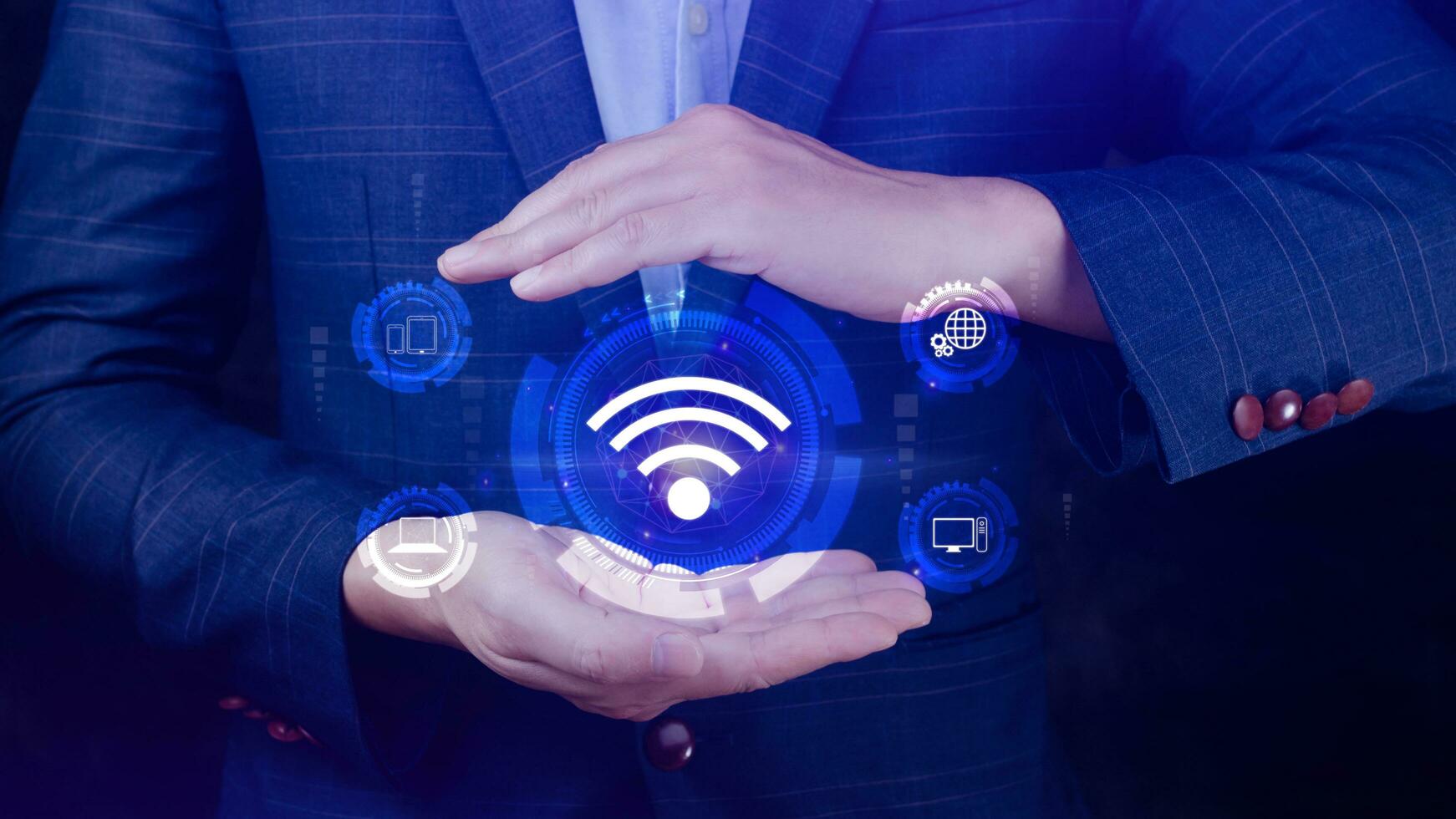 Businessman using holding with wifi icon. Social network business communication concept, Wifi wireless concept free network Internet concept. photo