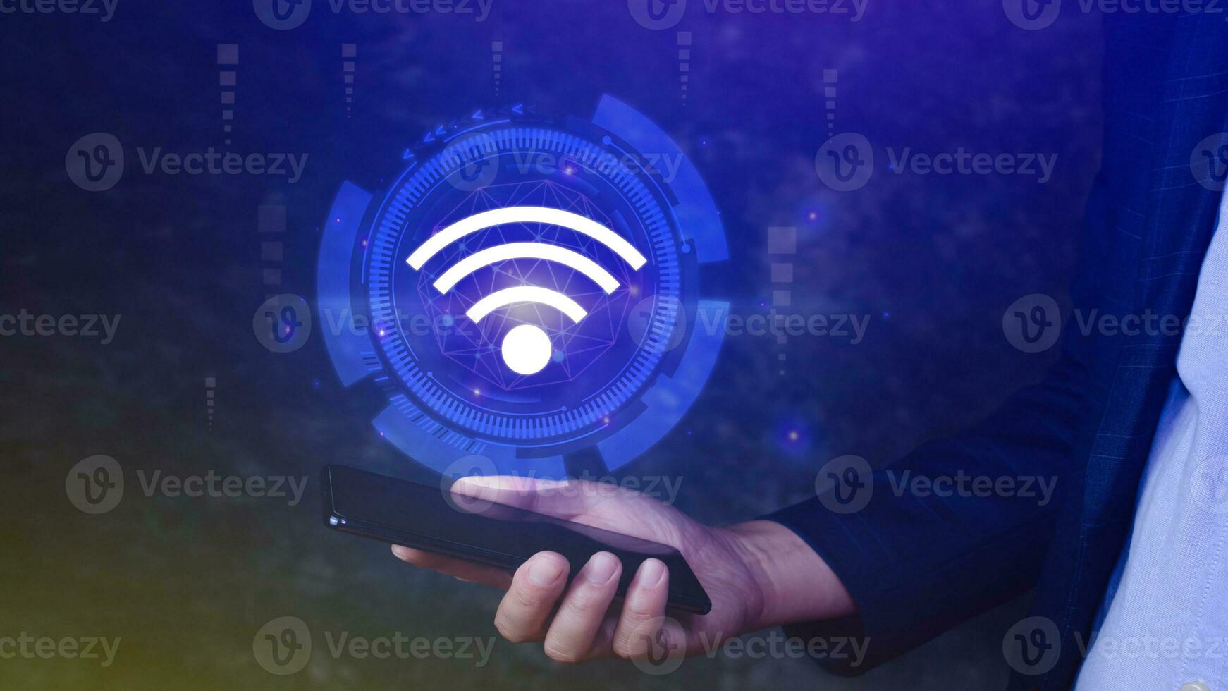 Businessman using smartphone with wifi icon. Social network business communication concept, Wifi wireless concept free network Internet concept. photo