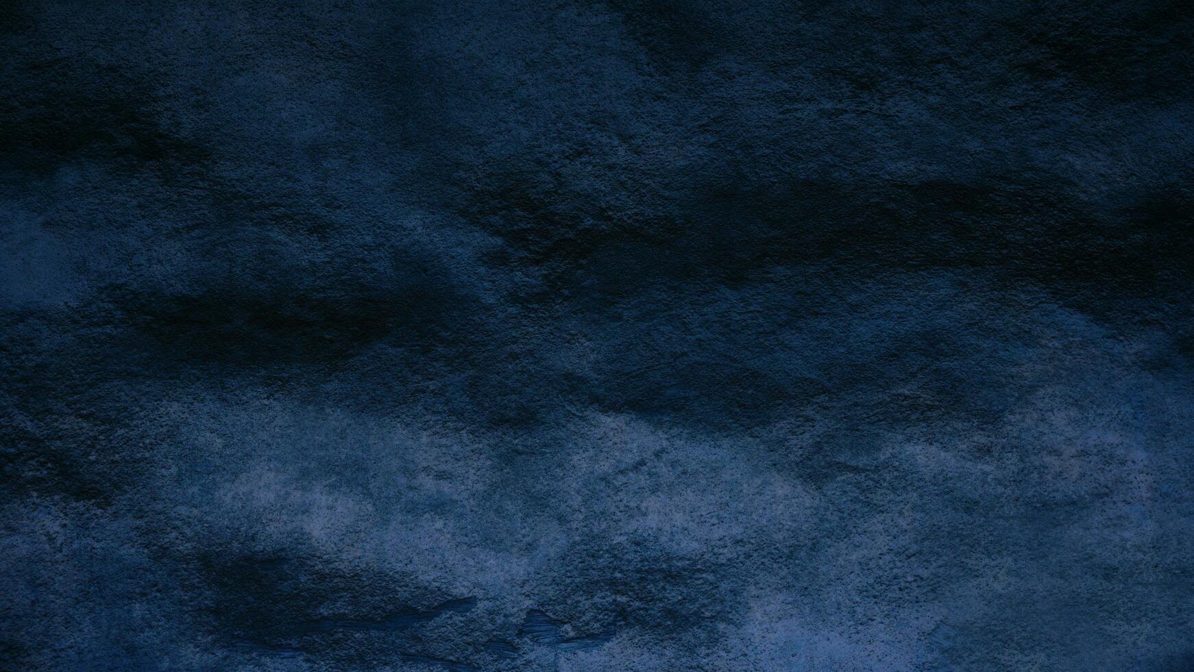 Beautiful abstract grungy blue stucco wall background, Beautiful empty stucco wall, Textured rough dark blue surface with space for text. photo