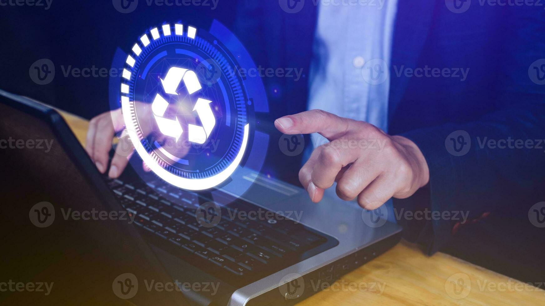 Businessman hand touching recycle icon concept in screen, for environmental, social and governance in sustainable and ethical business on the Network connection. photo