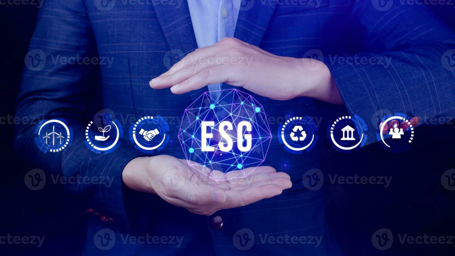 ESG icon concept in the hand for environmental, social and governance in sustainable and ethical business on the Network connection, businessman pressing button on screen. photo