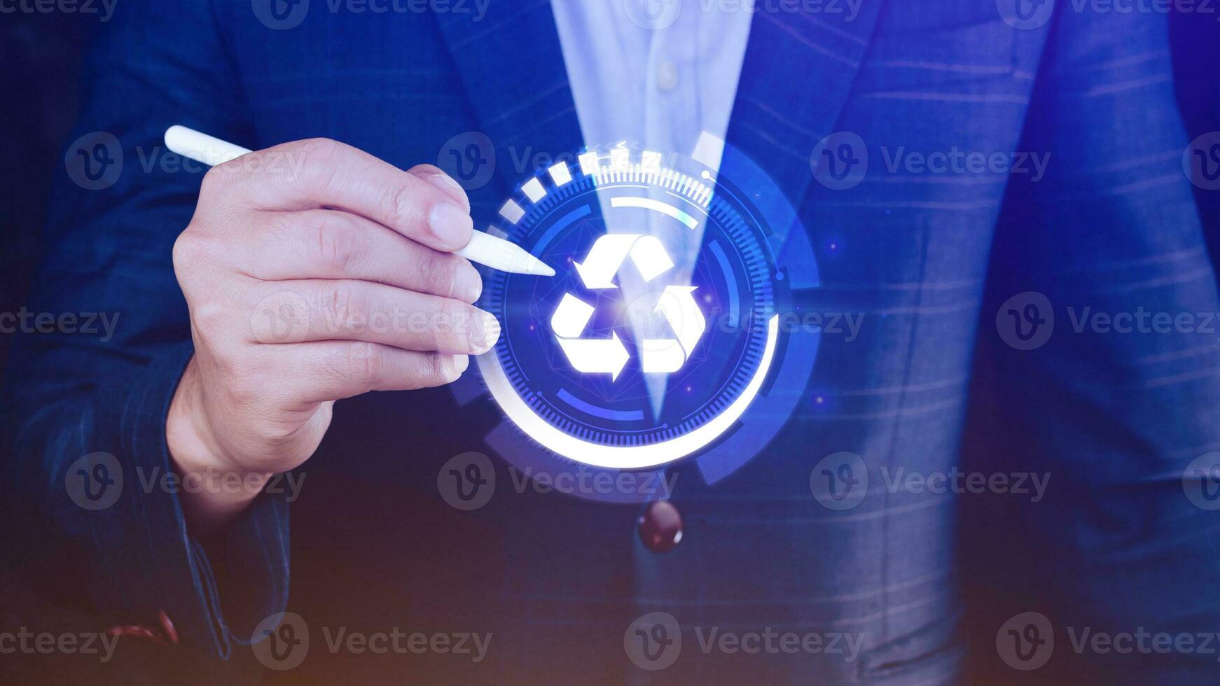 Businessman hand touching recycle icon concept in screen, for environmental, social and governance in sustainable and ethical business on the Network connection. photo