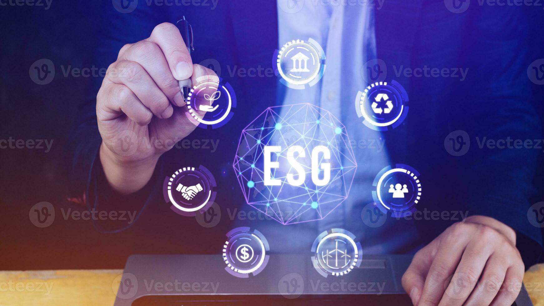 ESG icon concept in the hand for environmental, social and governance in sustainable and ethical business on the Network connection, businessman pressing button on screen. photo