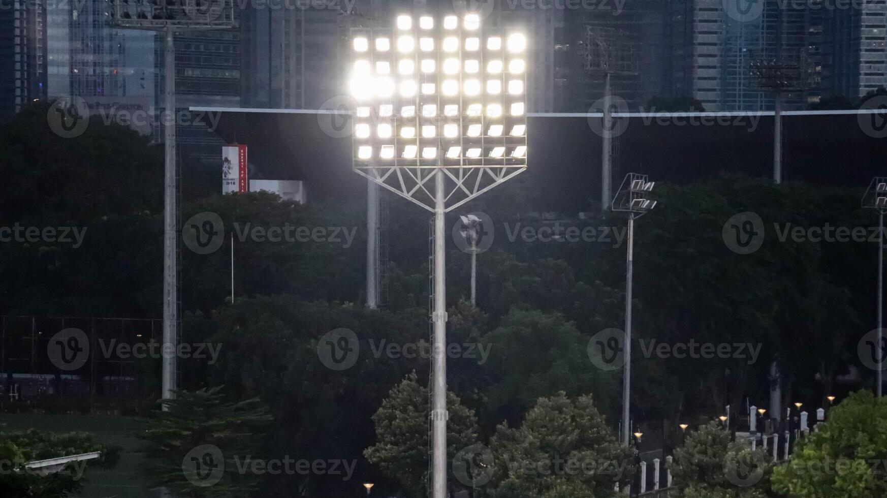 LED flooding light or standing sports stadium light at night. photo