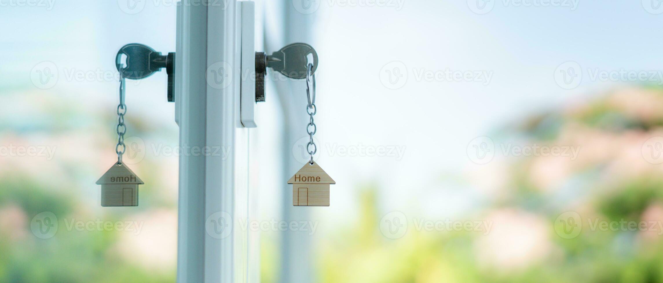 Landlord key for unlocking house is plugged into the door. Second hand house for rent and sale. Owner use hand unlock door mortgage for new home, buy, sell, renovate, investment, owner, estate photo