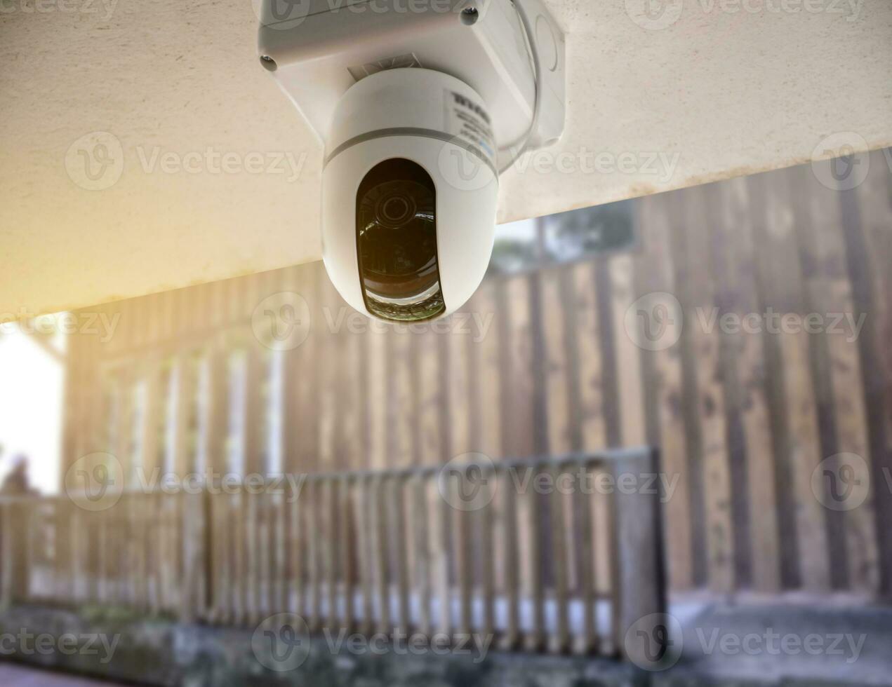 ip cctv camera installed on high ceiling of the house to do the security by monitoring through mobile phone and computer to save human life and property, soft and selecitve focus. photo