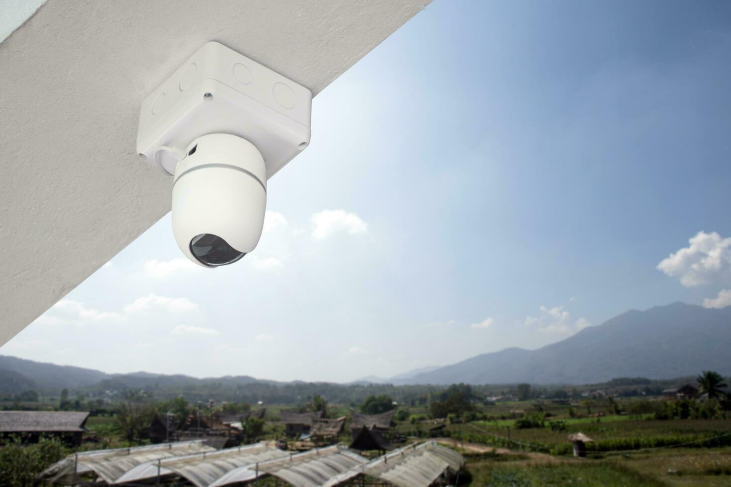 ip cctv camera installed on high ceiling of the house to do the security by monitoring through mobile phone and computer to save human life and property, soft and selecitve focus. photo
