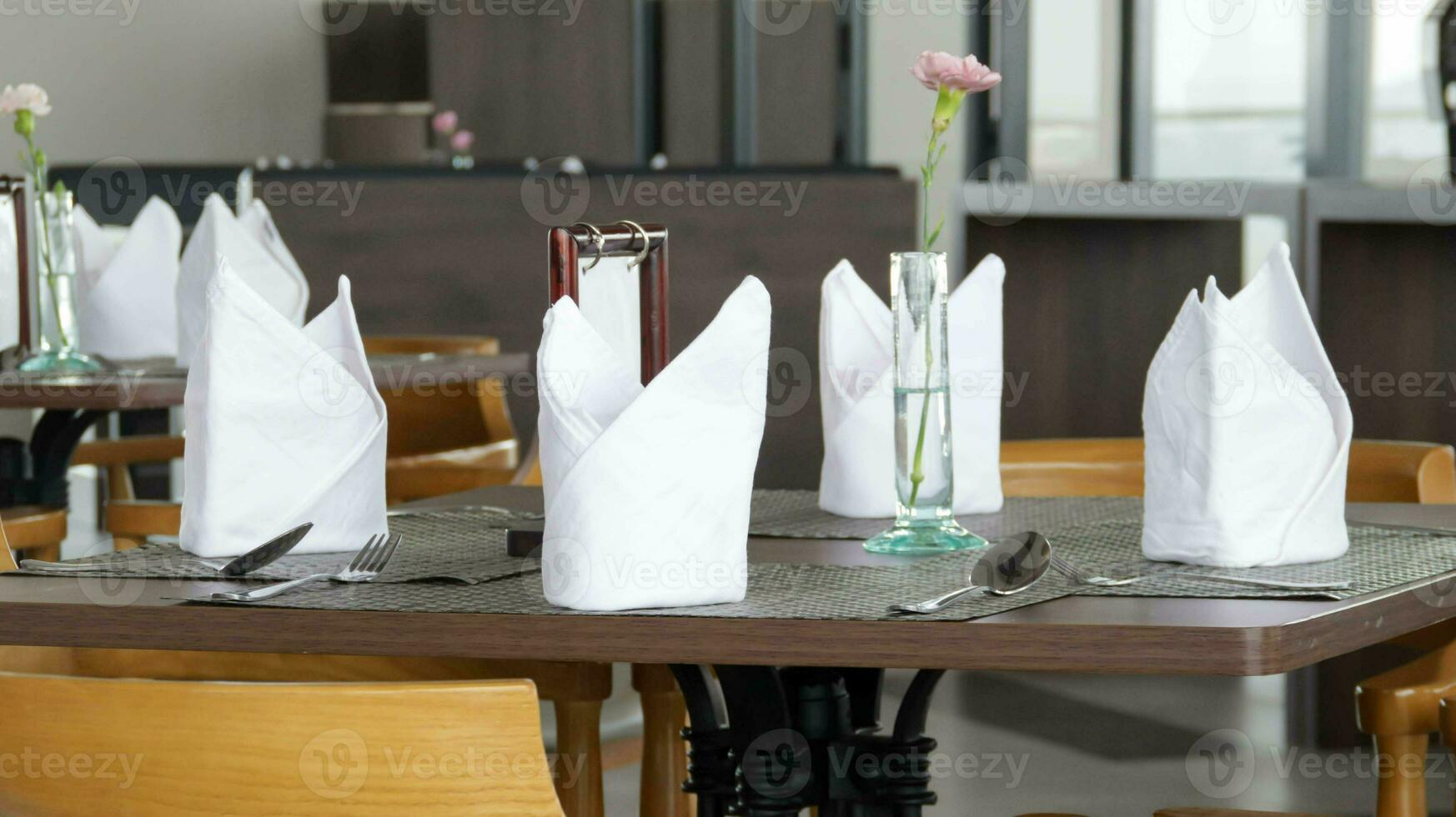 Table napkin and dining set at the restaurant. Food and beverage business concept. photo