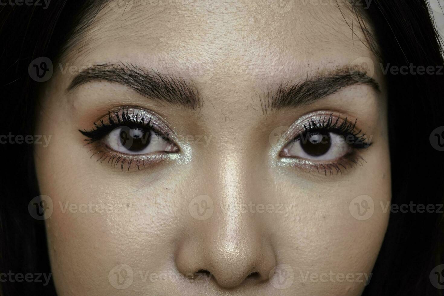 Close-up of beautiful female eye with perfect shape eyebrows. Clean skin, fashion naturel make-up. Good vision photo