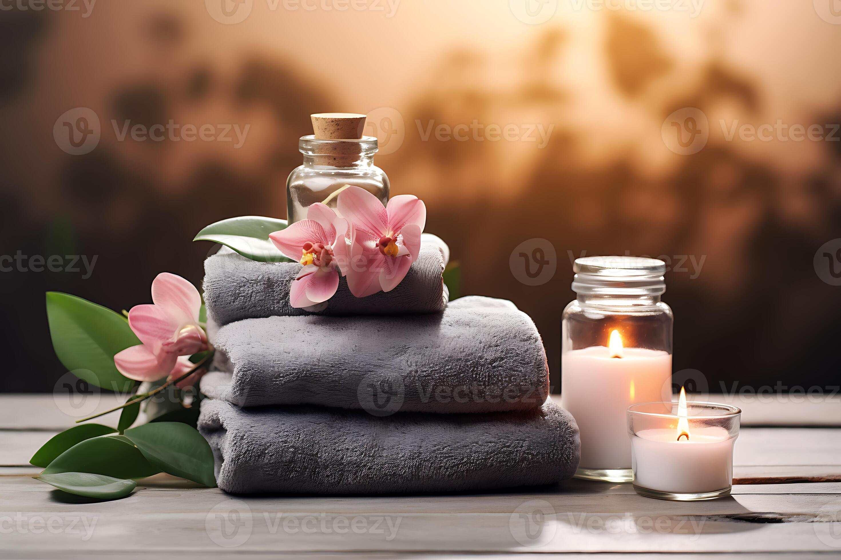 Beautiful spa composition on massage table. Towel on fern with