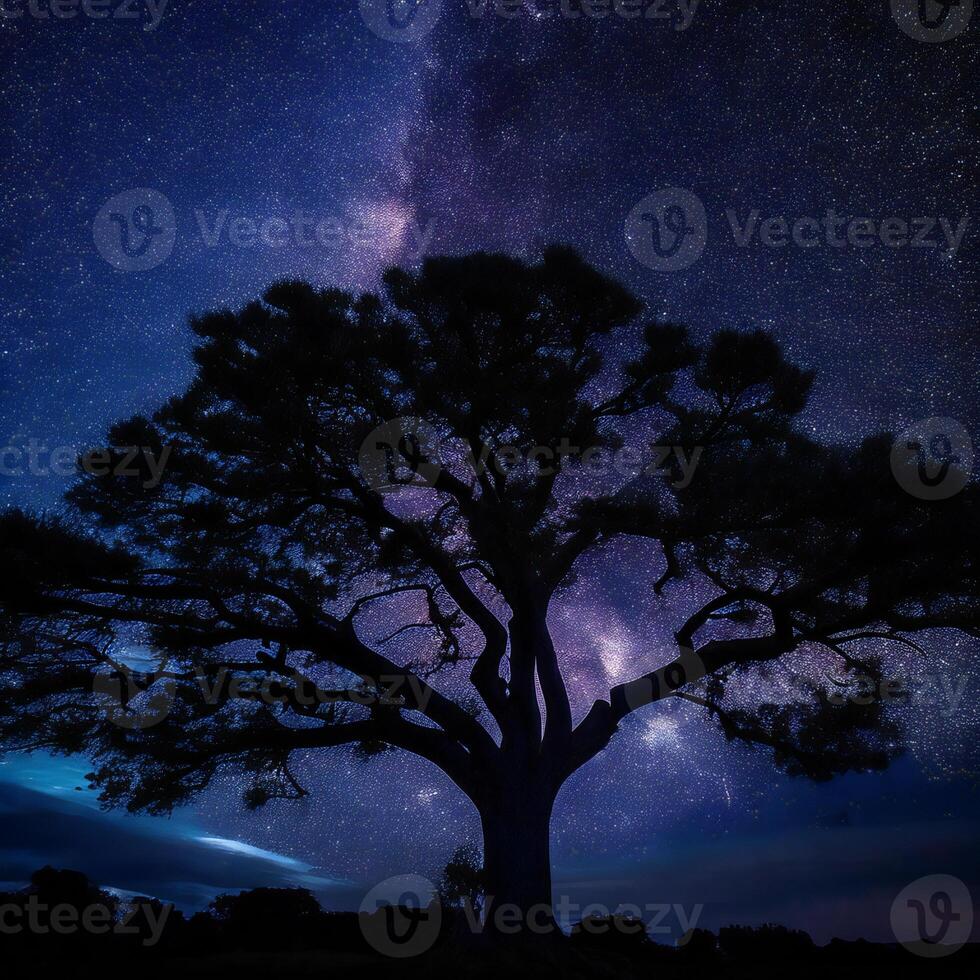 a majestic tree silhouetted against a backdrop of the vast night sky filled with stars ai generated photo