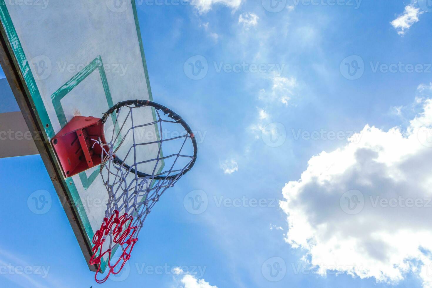 Basketball hoop on  blue sky photo