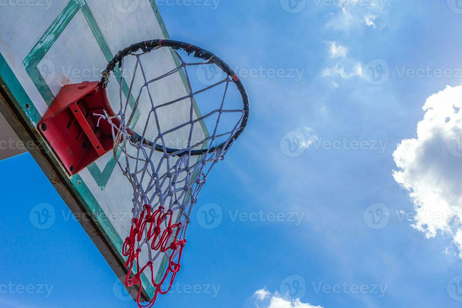 Basketball hoop on  blue sky photo