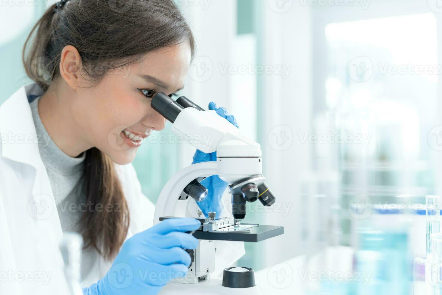 Scientist analyze biochemical samples in advanced scientific laboratory. Medical professional use microscope look microbiological developmental of viral. Biotechnology research in science lab. photo