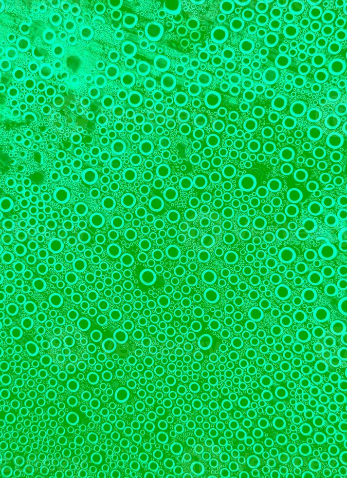 abstract drops on the surface of transparent plastic. Smooth small bubbles in the shape of a regular circle, abstract background of water bubbles photo