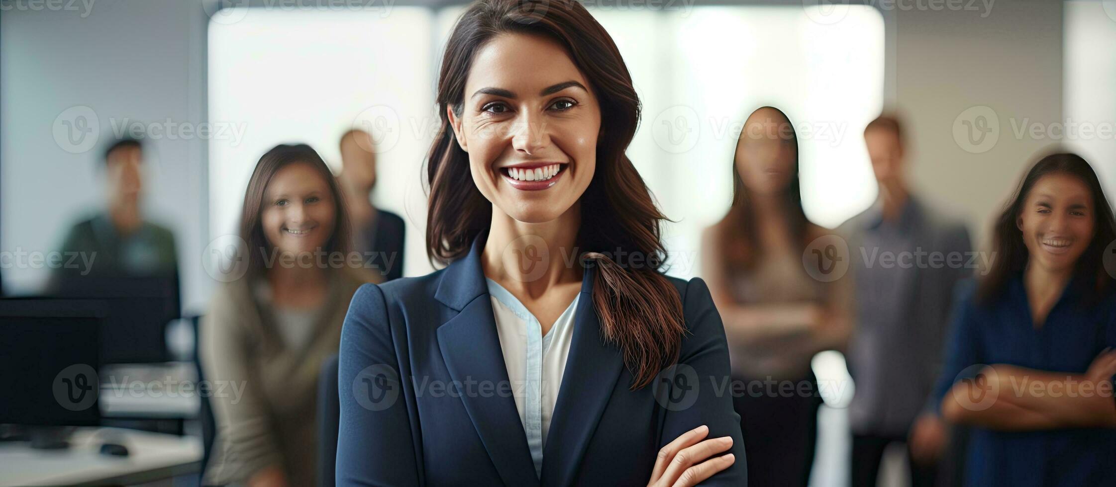 Confident businesswoman leading meeting in office and using tablet photo