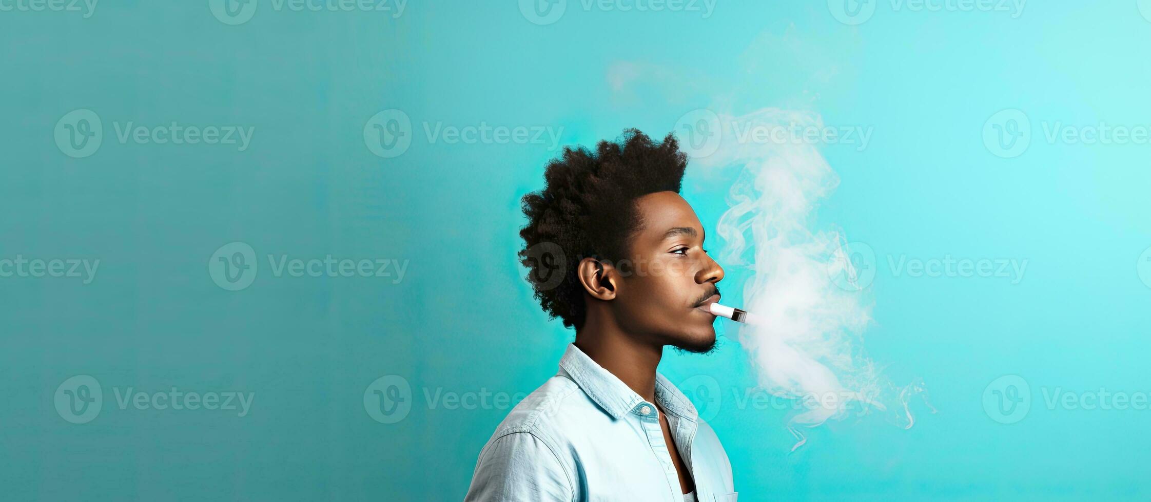 Blue background man using vaping device room for text photo