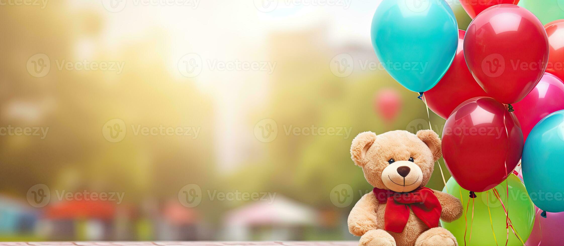 Little girl with autism happily playing with her best friend a teddy bear while holding colorful helium balloons in a green park playground with copy s photo