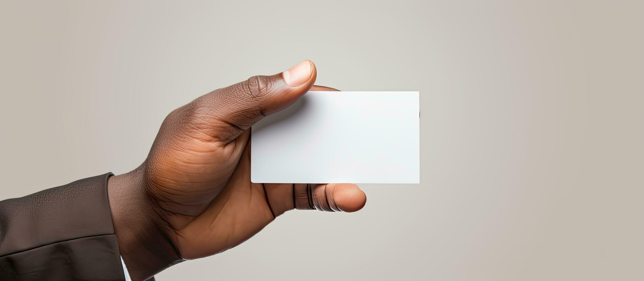 Biracial man holding business cards on white background for writing concept photo